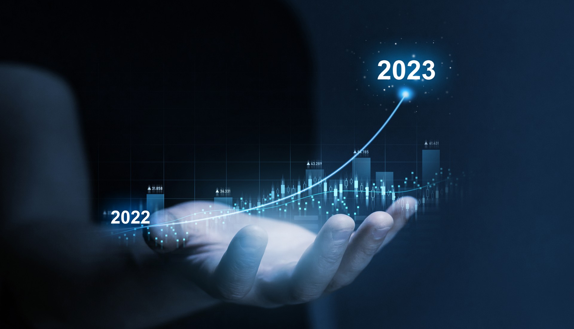 Businessman draws increase arrow graph corporate future growth year 2022 to 2023. Planning,opportunity, challenge and business strategy.